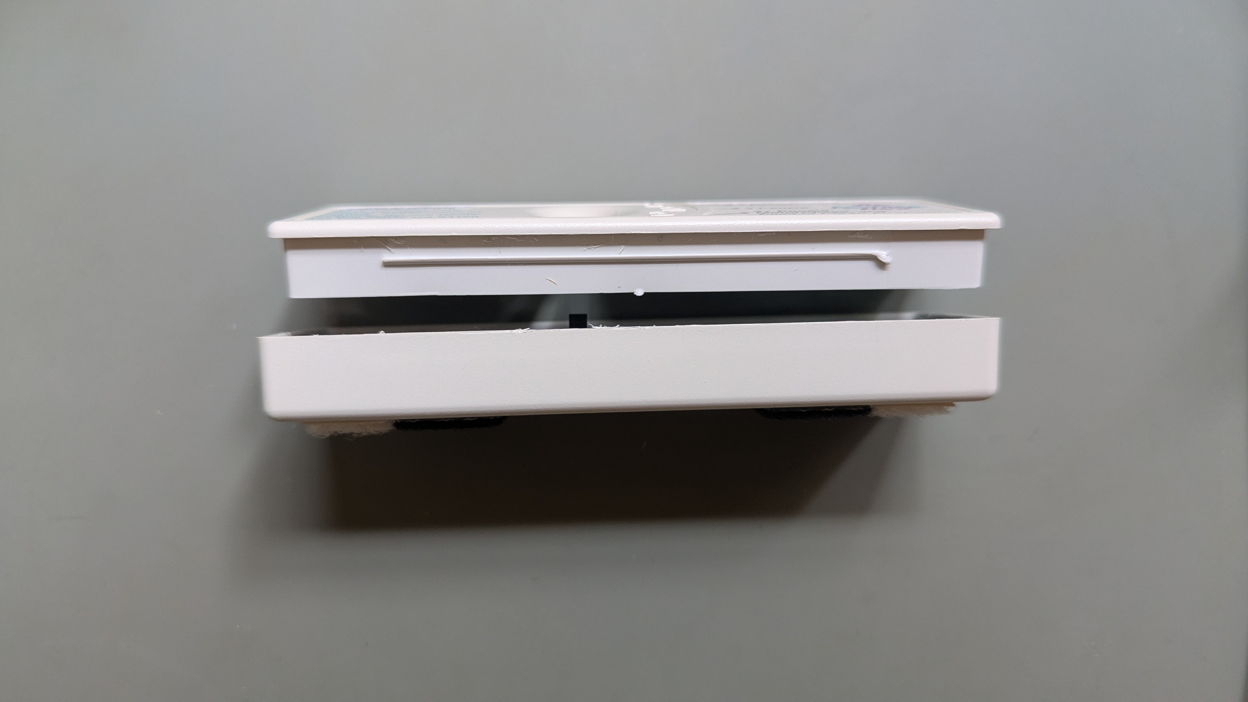 The old toll tag housing opened